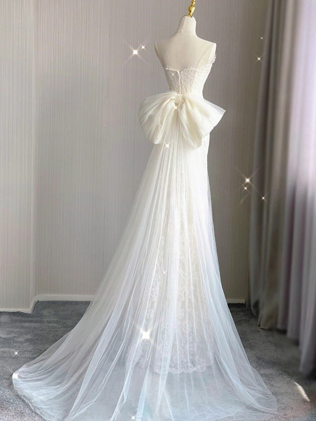 Vestido de novia de tul color marfil con encaje y corte princesa sirena sin tirantes GG2938