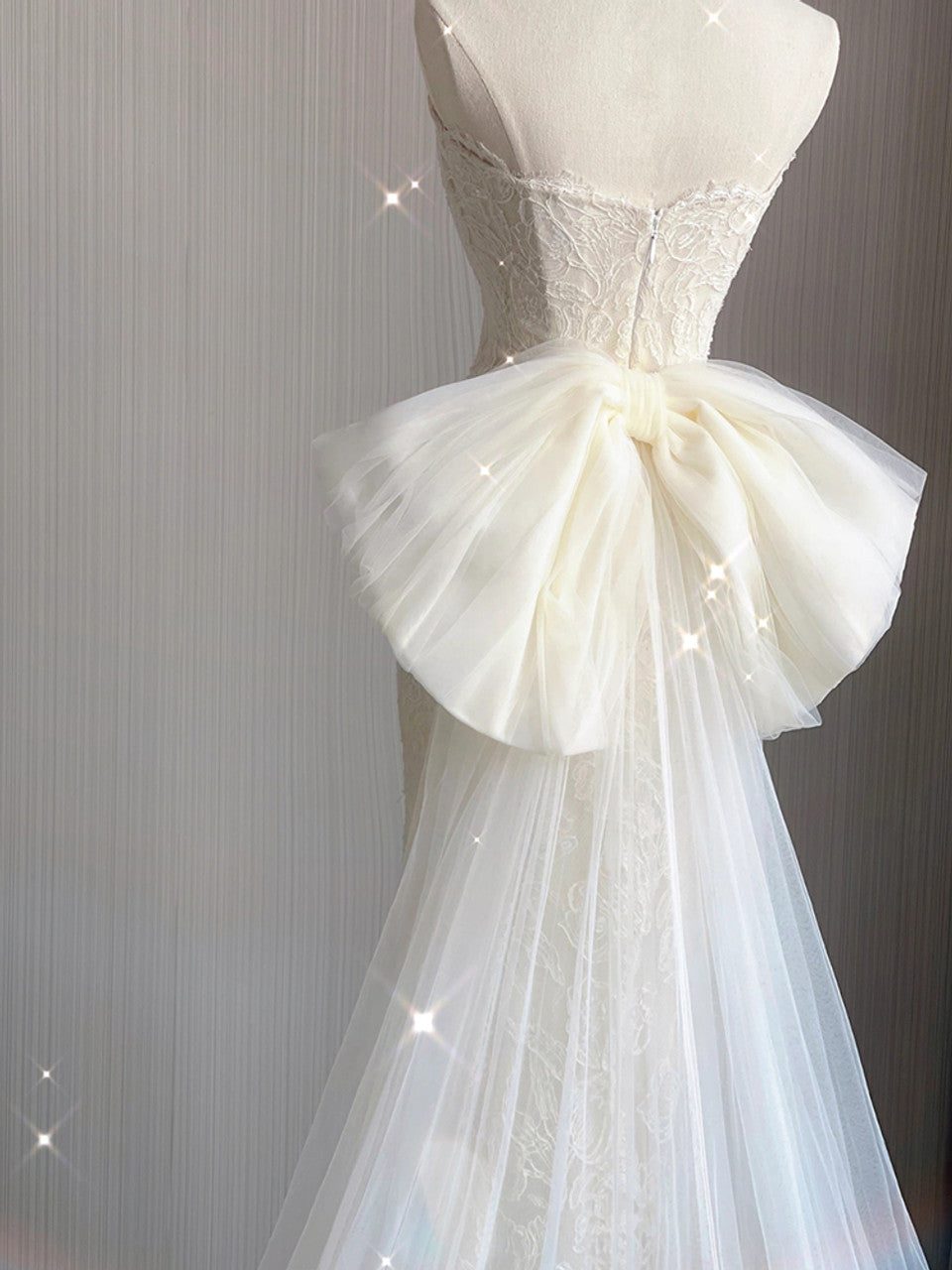 Vestido de novia de tul color marfil con encaje y corte princesa sirena sin tirantes GG2938