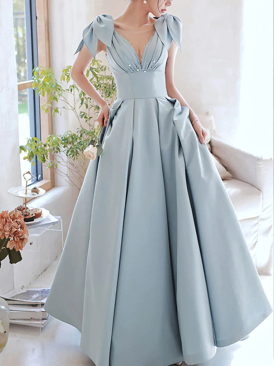Vestido de fiesta largo de satén con escote en V azul y cuentas, lazo en el hombro