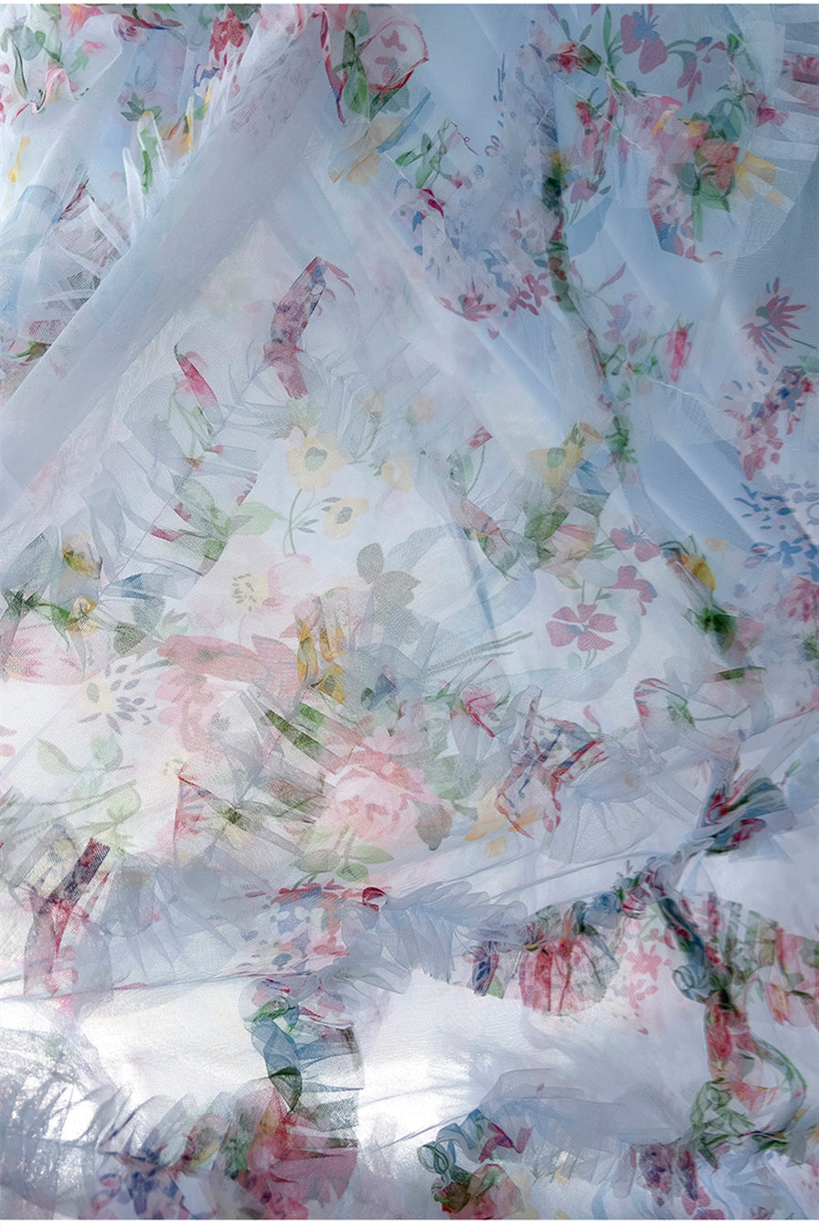 Hermosos vestidos de noche formales largos con frunces y estampado floral azul con tirantes