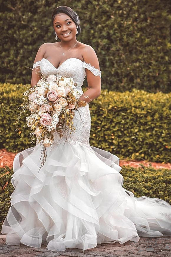 Vestidos de novia largos con volantes y escote corazón y hombros descubiertos
