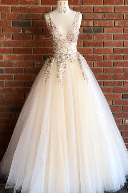 Hermoso vestido de fiesta largo con escote en V y bordado floral
