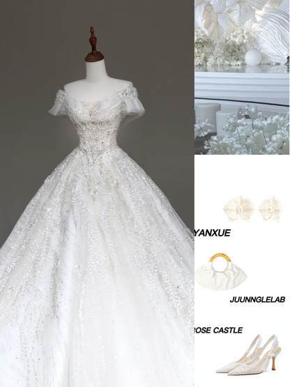 Vestido de novia de lujo con hombros descubiertos, mangas cortas y lentejuelas, con cola DP648