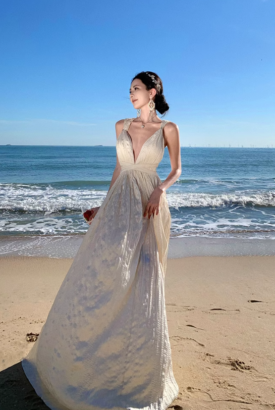 Vestido playero largo color albaricoque, corte A, cuello halter y espalda descubierta ED01197