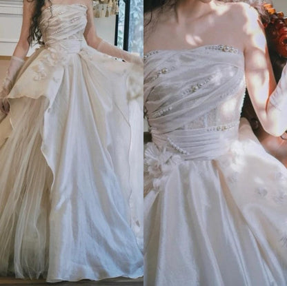 Vestidos de novia largos de satén y tul con corte en A en color rosa dulce, sin tirantes y con apliques ED01476
