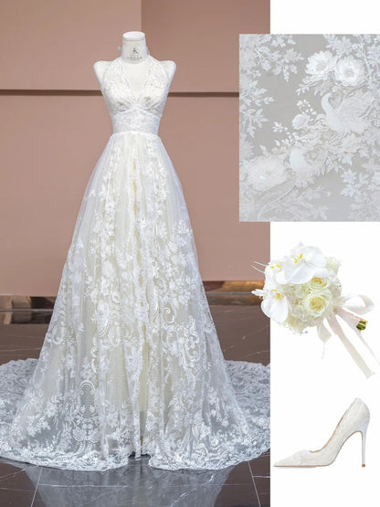 Elegante vestido de novia blanco con escote en V, apliques de encaje y cola ED02345