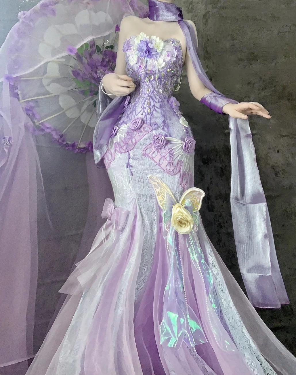 Hermoso vestido de fiesta largo de tul con apliques y corte sirena sin tirantes en morado para quinceañeras ED02501