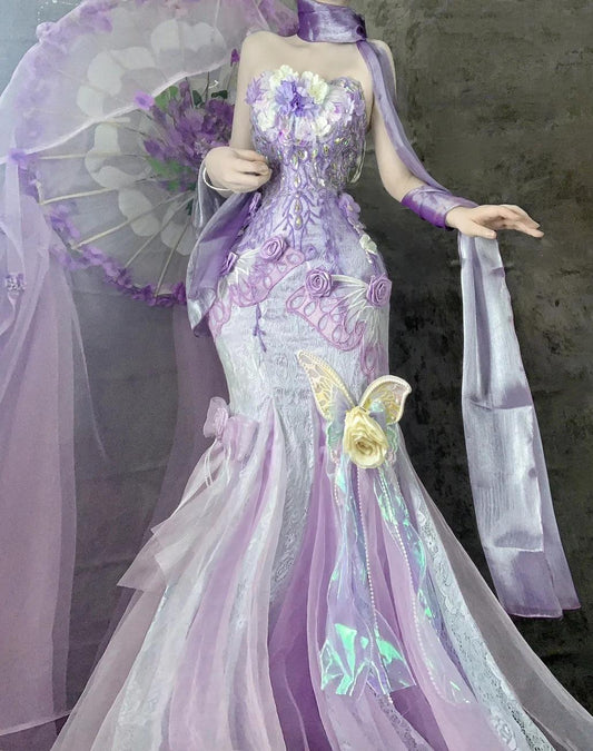 Hermoso vestido de fiesta largo de tul con apliques y corte sirena sin tirantes en morado para quinceañeras ED02501