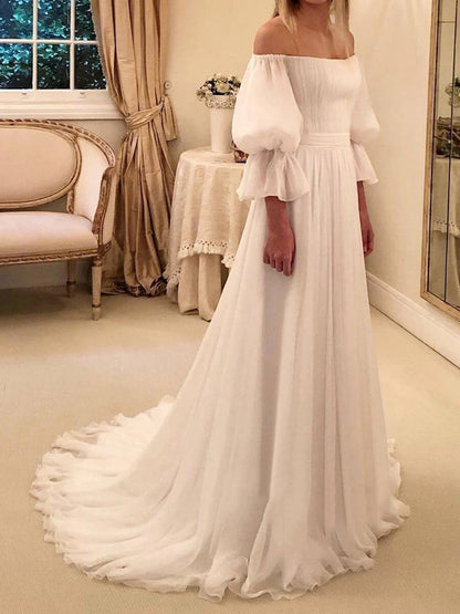 Elegantes vestidos de novia de playa de gasa con mangas 3/4