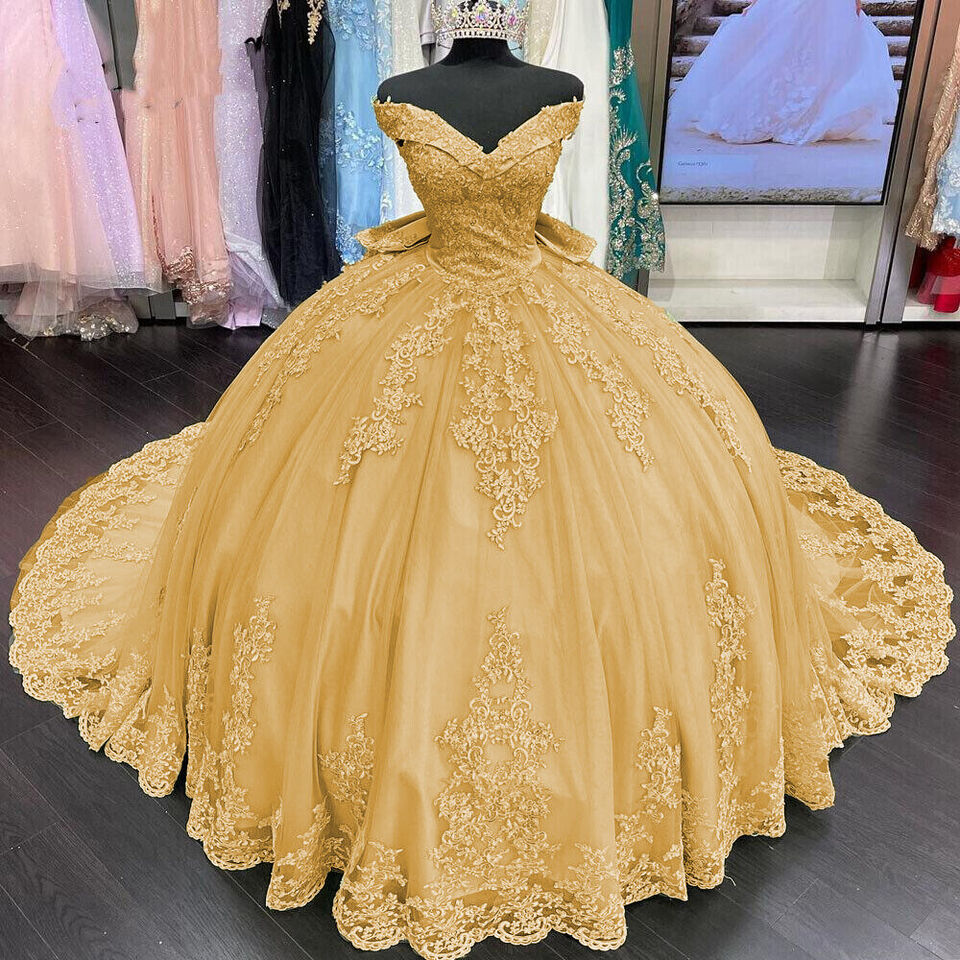 Vestidos de quinceañera dorados con hombros descubiertos y encaje de princesa, apliques con lazo