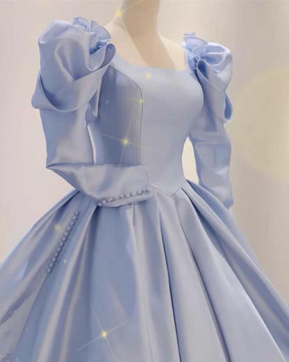 Vestidos de fiesta de satén con mangas abullonadas y espalda abierta