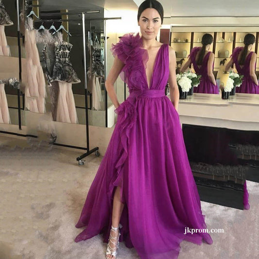 Vestido de fiesta fucsia de corte A con escote en V y bolsillos