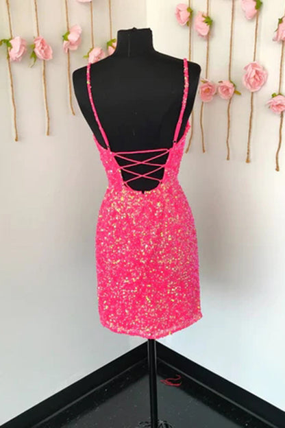 Vestido corto de fiesta con tirantes finos, lentejuelas rosas y espalda cruzada