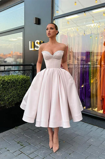Vestido de fiesta de satén estilo retro rosa claro con escote en forma de corazón, sin tirantes, corte A, TP4052