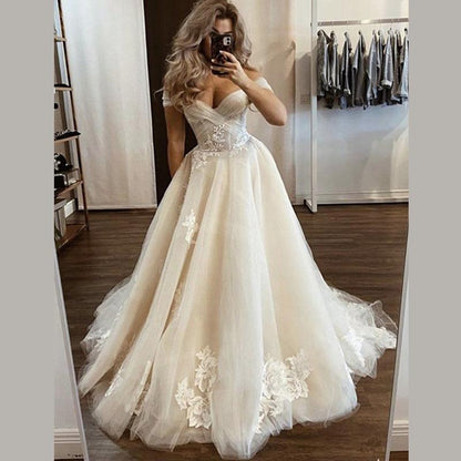 Elegante vestido de fiesta largo de encaje con escote en V y hombros descubiertos en forma de A